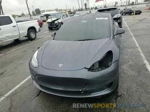 11 Photograph of a damaged car 5YJ3E1EA0PF608683 TESLA MODEL 3 2023