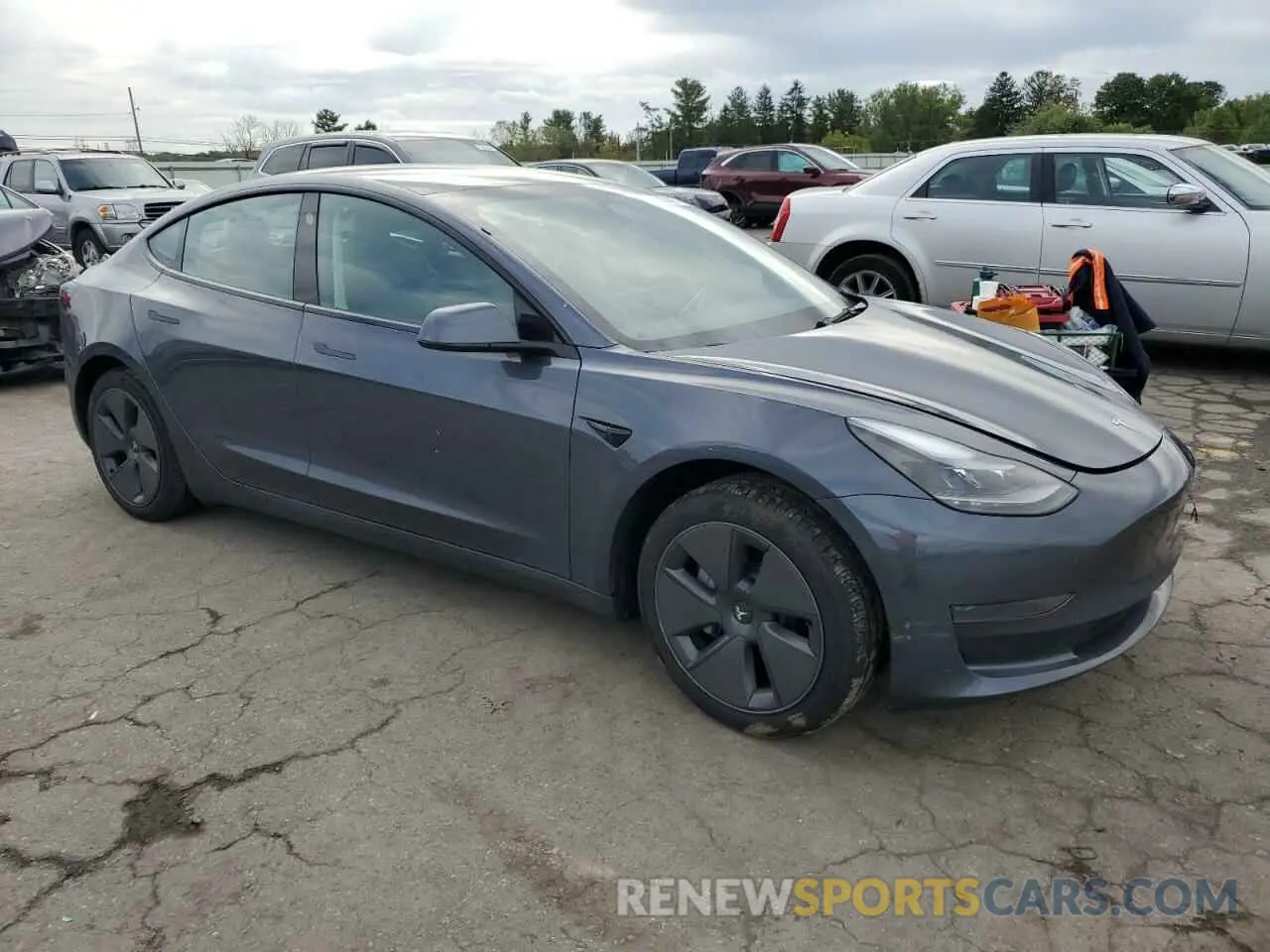 4 Photograph of a damaged car 5YJ3E1EA0PF613267 TESLA MODEL 3 2023