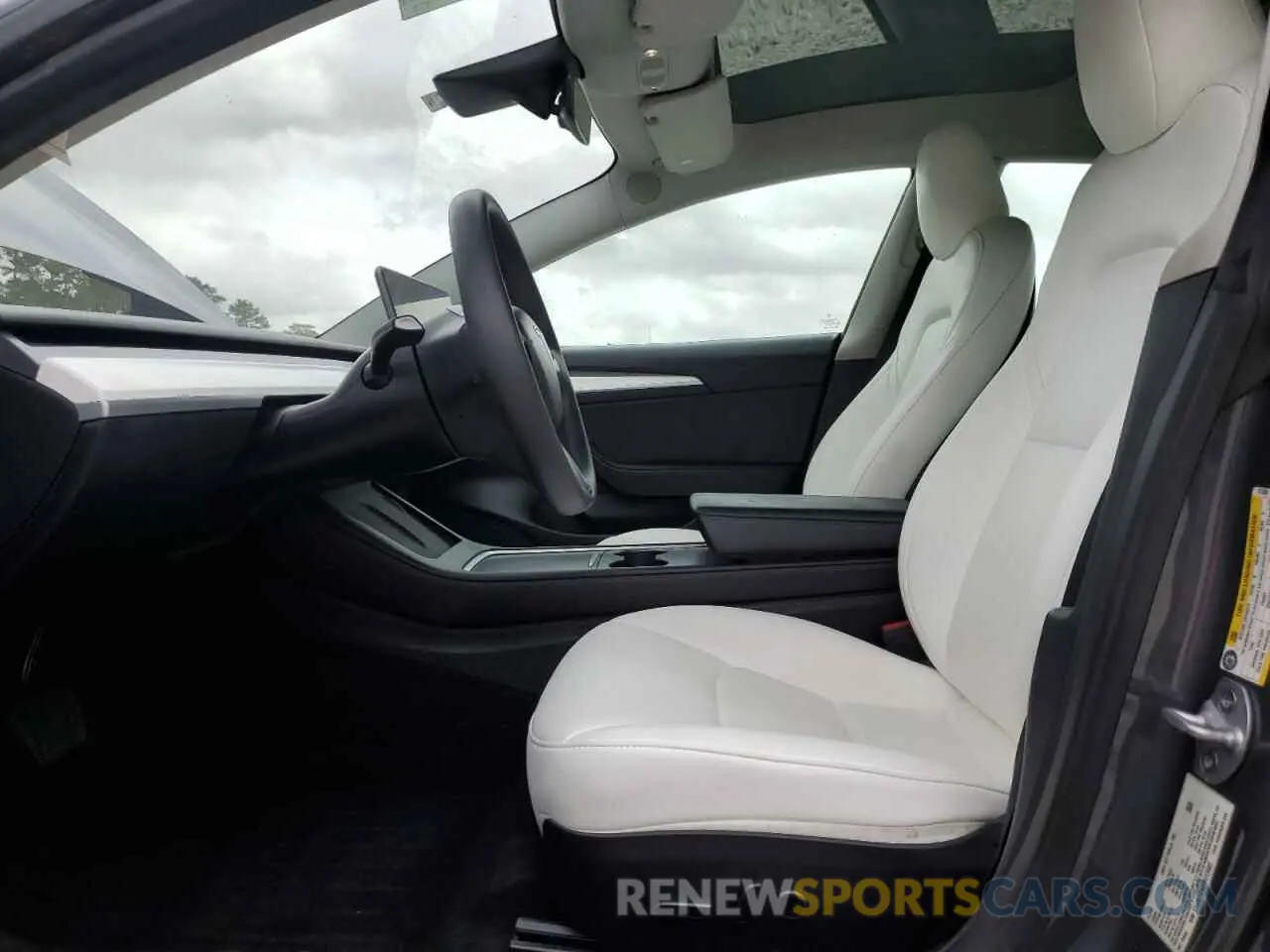 7 Photograph of a damaged car 5YJ3E1EA0PF613382 TESLA MODEL 3 2023
