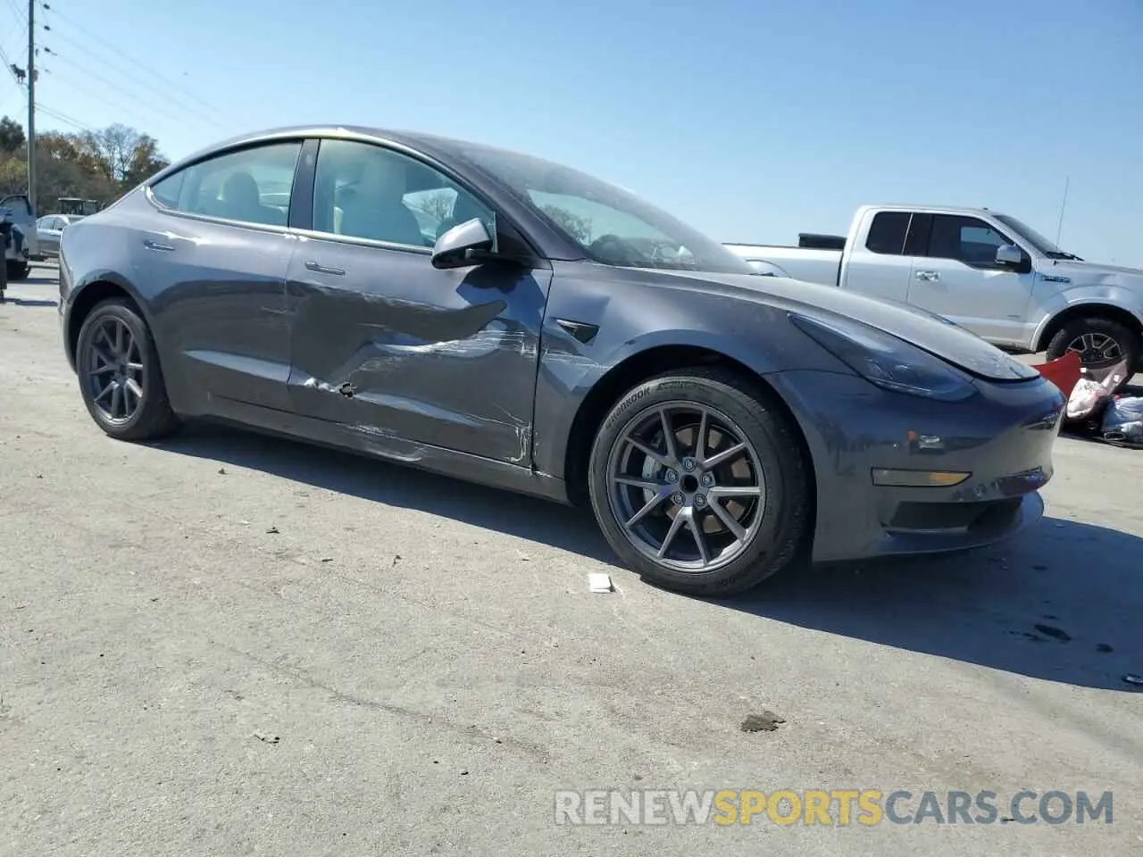 4 Photograph of a damaged car 5YJ3E1EA0PF644454 TESLA MODEL 3 2023