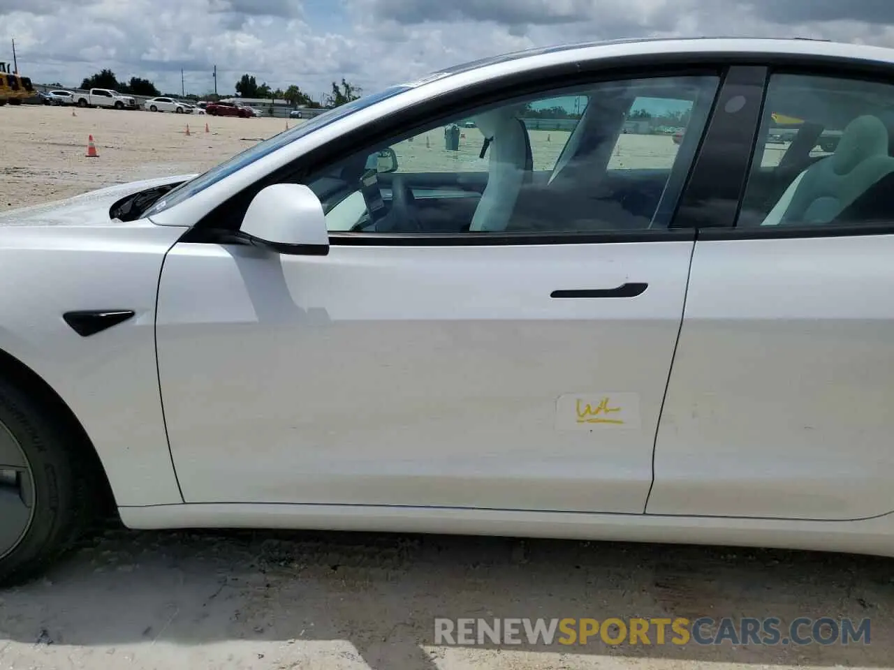 12 Photograph of a damaged car 5YJ3E1EA0PF653560 TESLA MODEL 3 2023