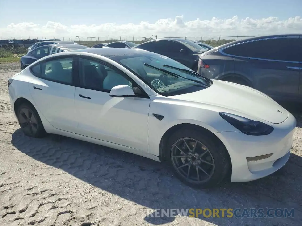 4 Photograph of a damaged car 5YJ3E1EA0PF653560 TESLA MODEL 3 2023