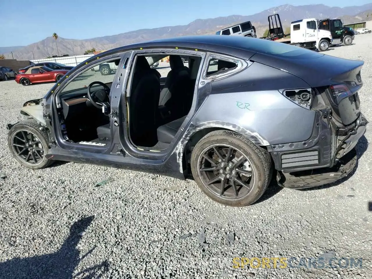 2 Photograph of a damaged car 5YJ3E1EA0PF658967 TESLA MODEL 3 2023
