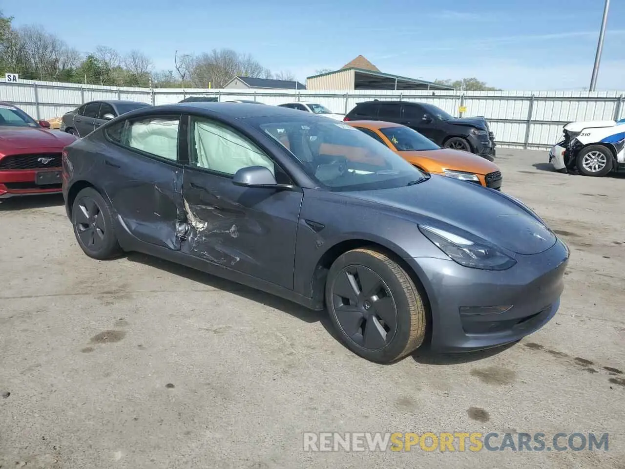 4 Photograph of a damaged car 5YJ3E1EA0PF671606 TESLA MODEL 3 2023