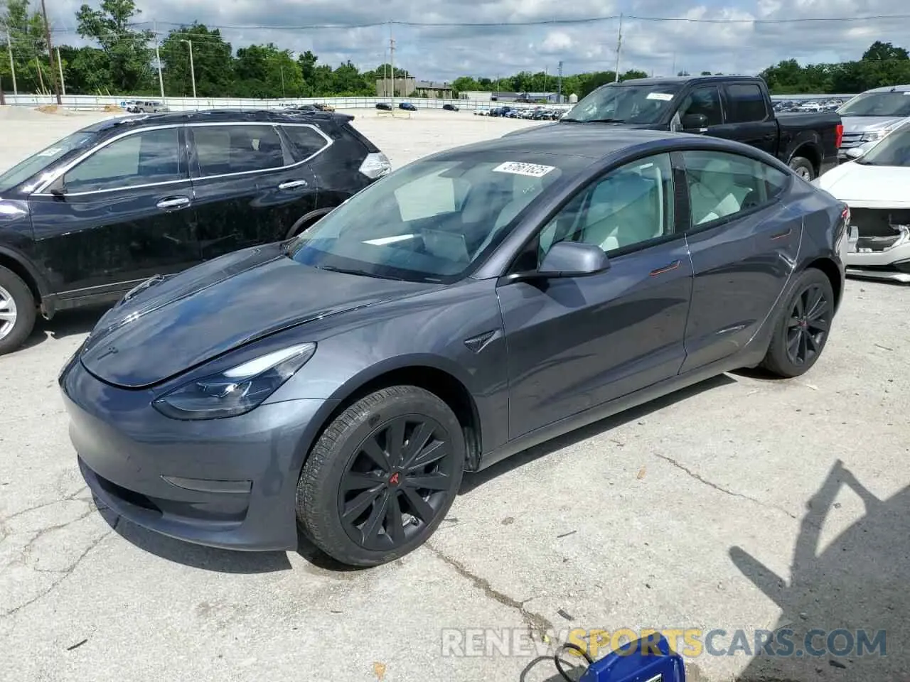 1 Photograph of a damaged car 5YJ3E1EA0PF677471 TESLA MODEL 3 2023