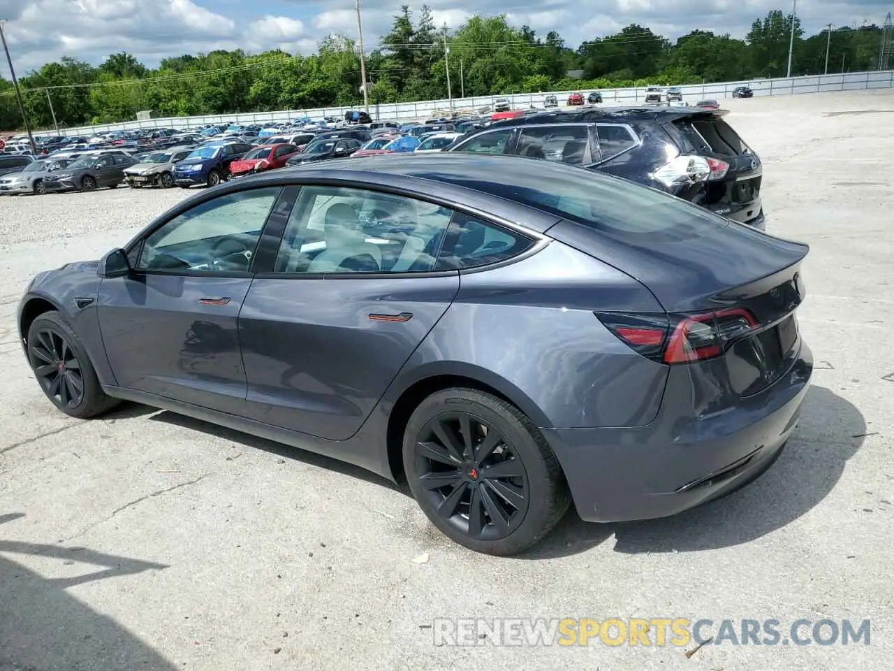 2 Photograph of a damaged car 5YJ3E1EA0PF677471 TESLA MODEL 3 2023