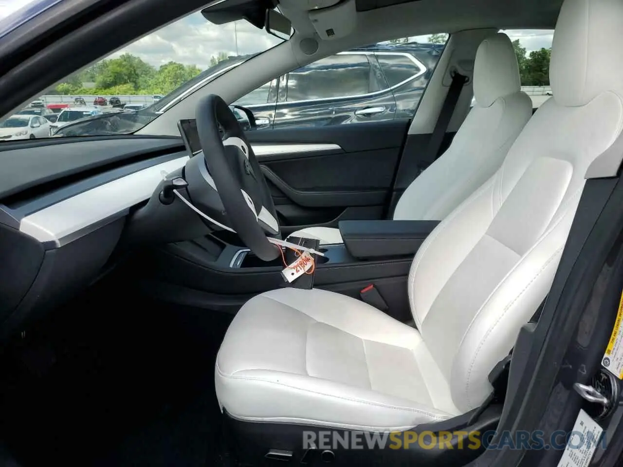 7 Photograph of a damaged car 5YJ3E1EA0PF677471 TESLA MODEL 3 2023