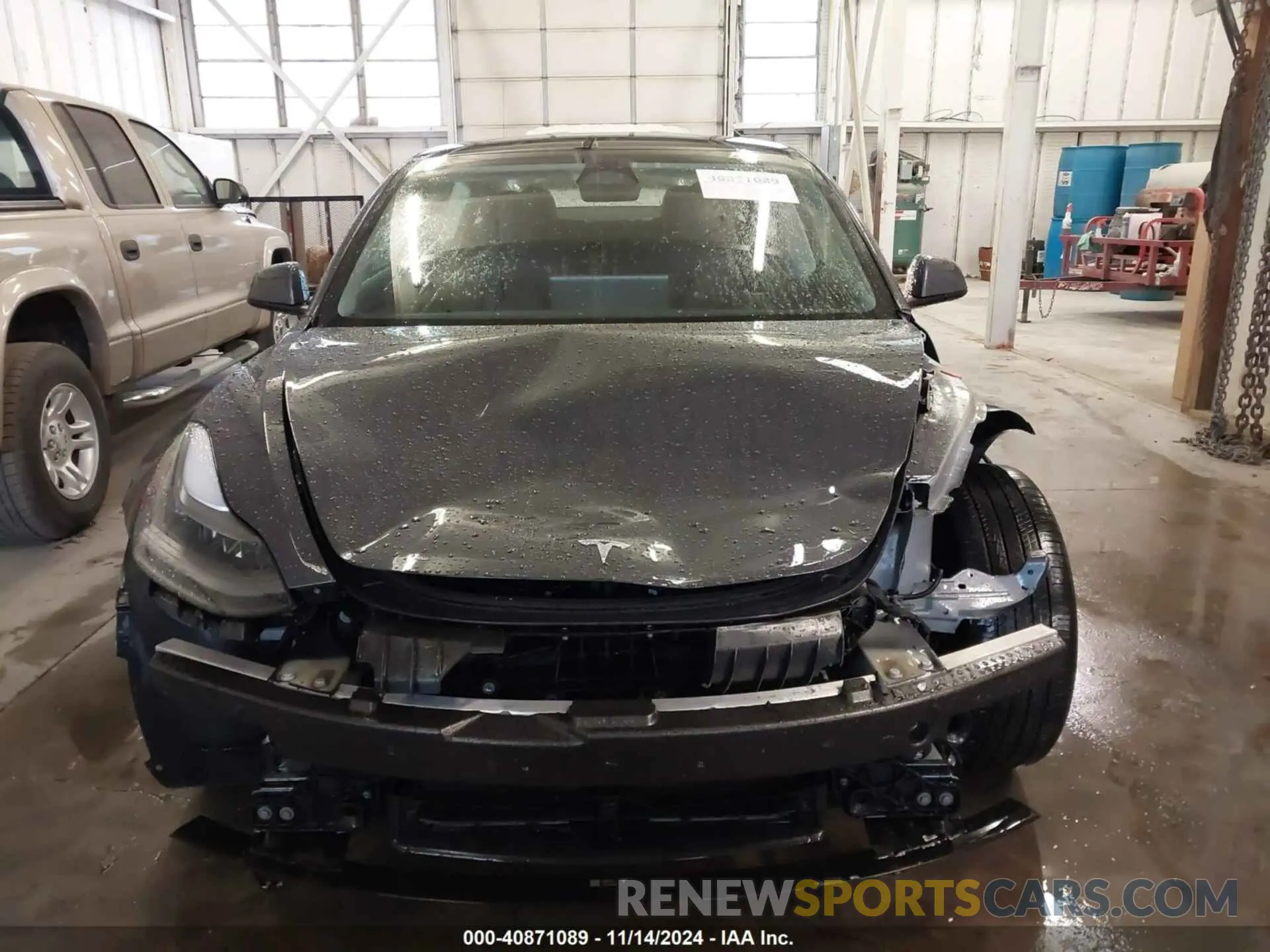 13 Photograph of a damaged car 5YJ3E1EA0PF698028 TESLA MODEL 3 2023