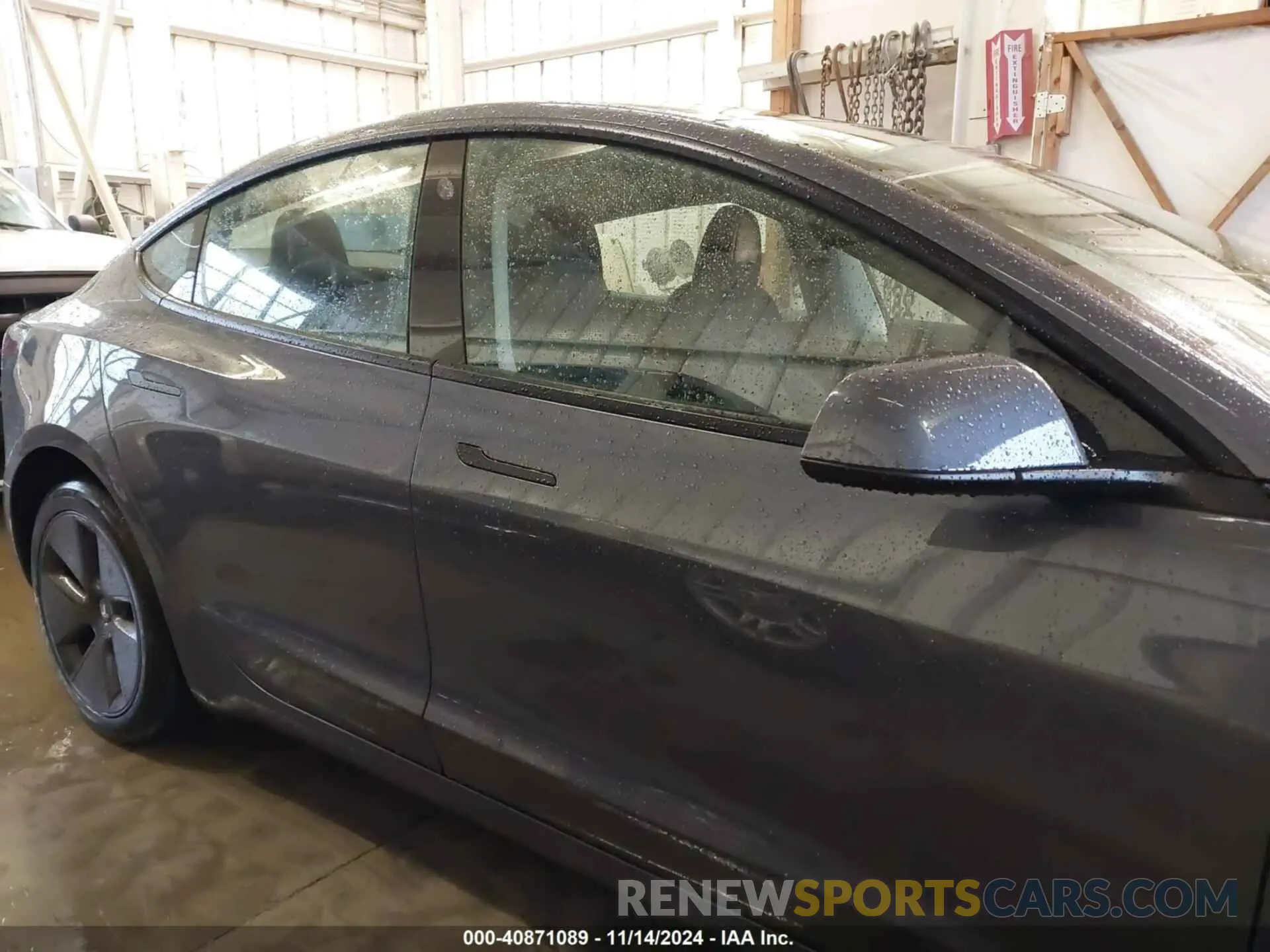 14 Photograph of a damaged car 5YJ3E1EA0PF698028 TESLA MODEL 3 2023