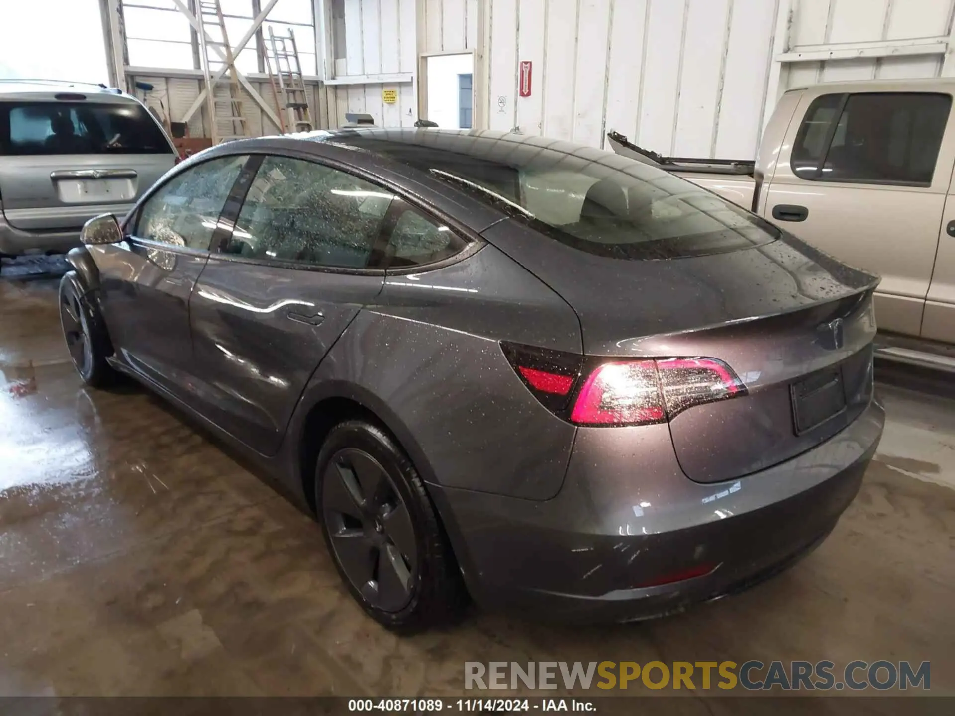 3 Photograph of a damaged car 5YJ3E1EA0PF698028 TESLA MODEL 3 2023
