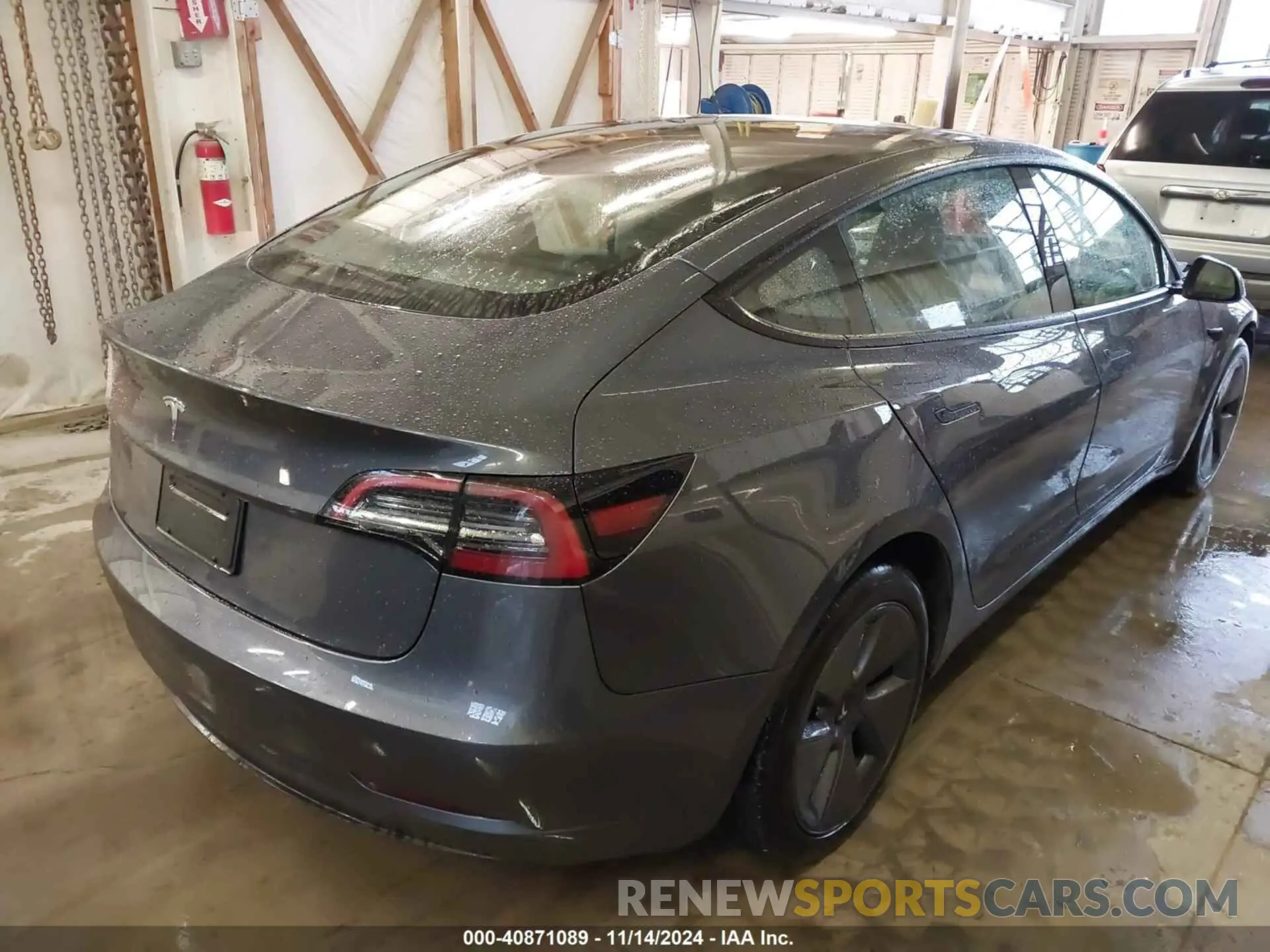 4 Photograph of a damaged car 5YJ3E1EA0PF698028 TESLA MODEL 3 2023