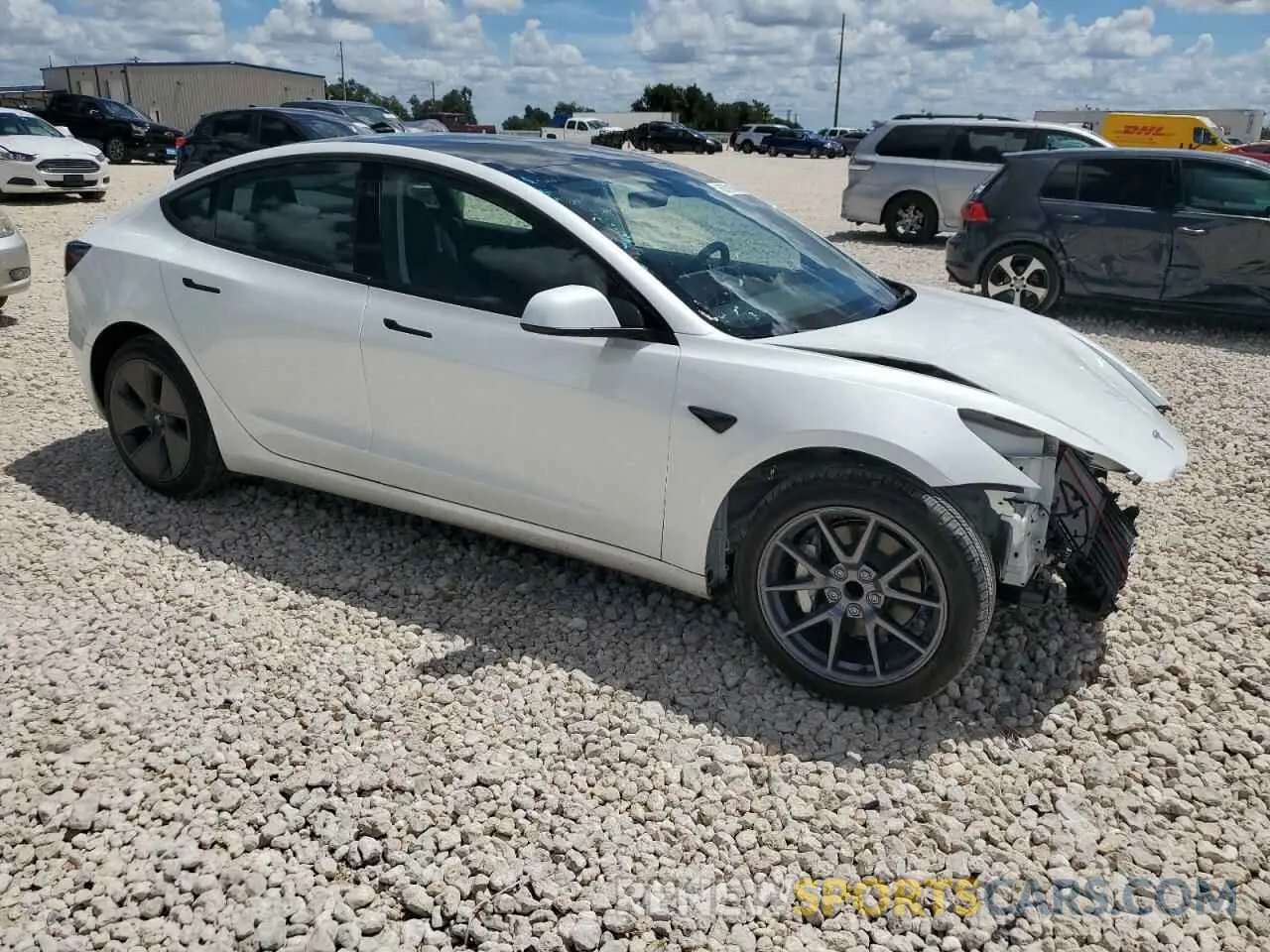 4 Photograph of a damaged car 5YJ3E1EA0PF701915 TESLA MODEL 3 2023