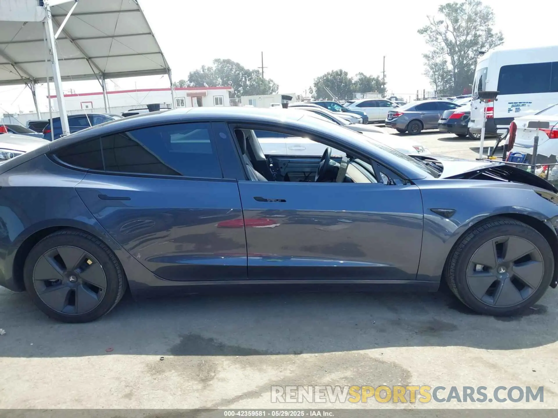 14 Photograph of a damaged car 5YJ3E1EA1PF403714 TESLA MODEL 3 2023