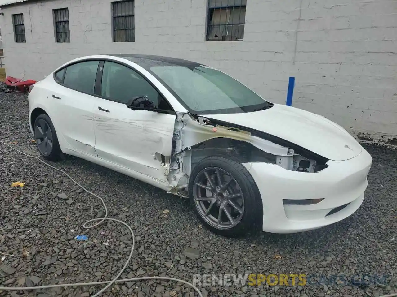 4 Photograph of a damaged car 5YJ3E1EA1PF406046 TESLA MODEL 3 2023