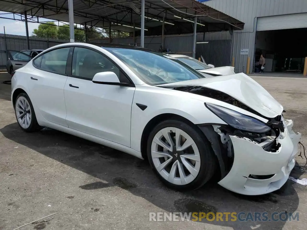 4 Photograph of a damaged car 5YJ3E1EA1PF427897 TESLA MODEL 3 2023