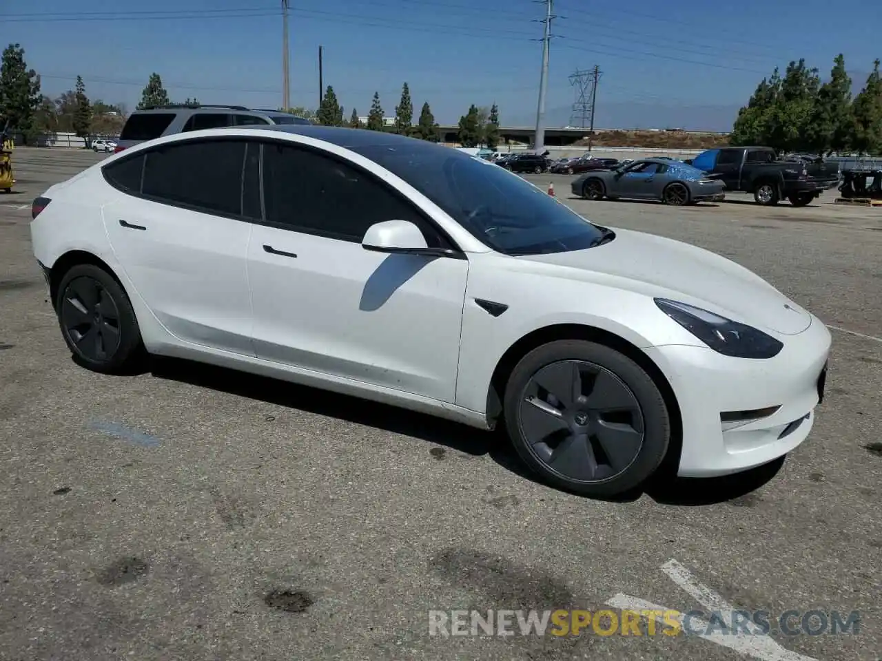 4 Photograph of a damaged car 5YJ3E1EA1PF432209 TESLA MODEL 3 2023