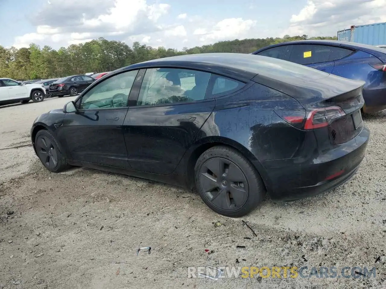 2 Photograph of a damaged car 5YJ3E1EA1PF437099 TESLA MODEL 3 2023