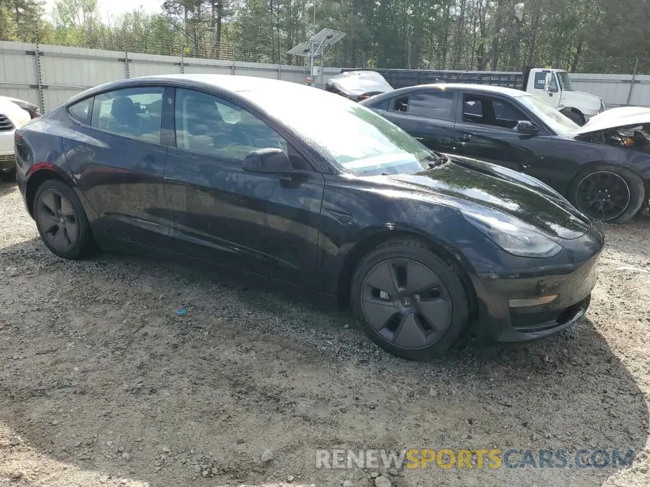 4 Photograph of a damaged car 5YJ3E1EA1PF437099 TESLA MODEL 3 2023