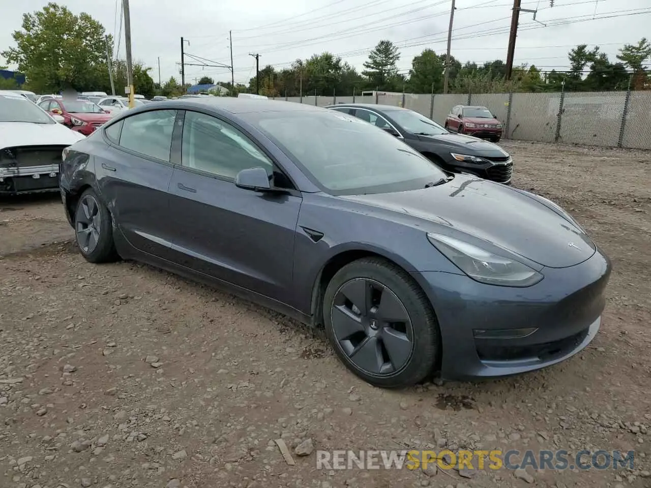 4 Photograph of a damaged car 5YJ3E1EA1PF484102 TESLA MODEL 3 2023
