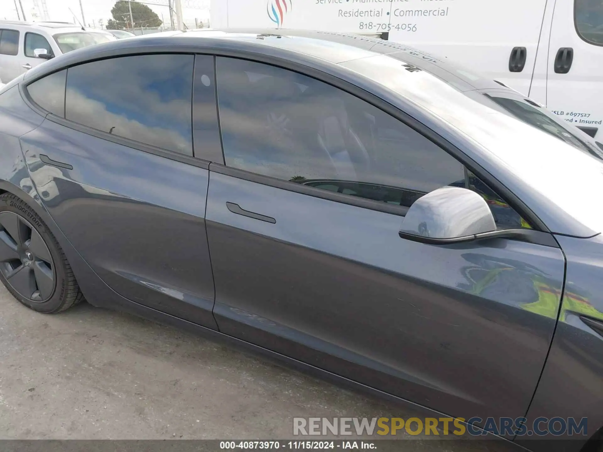 14 Photograph of a damaged car 5YJ3E1EA1PF489915 TESLA MODEL 3 2023