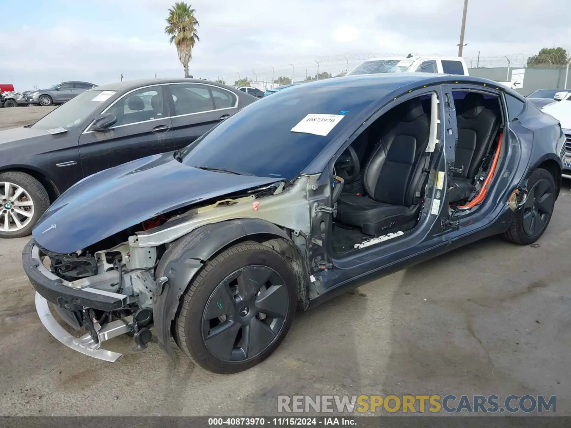 2 Photograph of a damaged car 5YJ3E1EA1PF489915 TESLA MODEL 3 2023