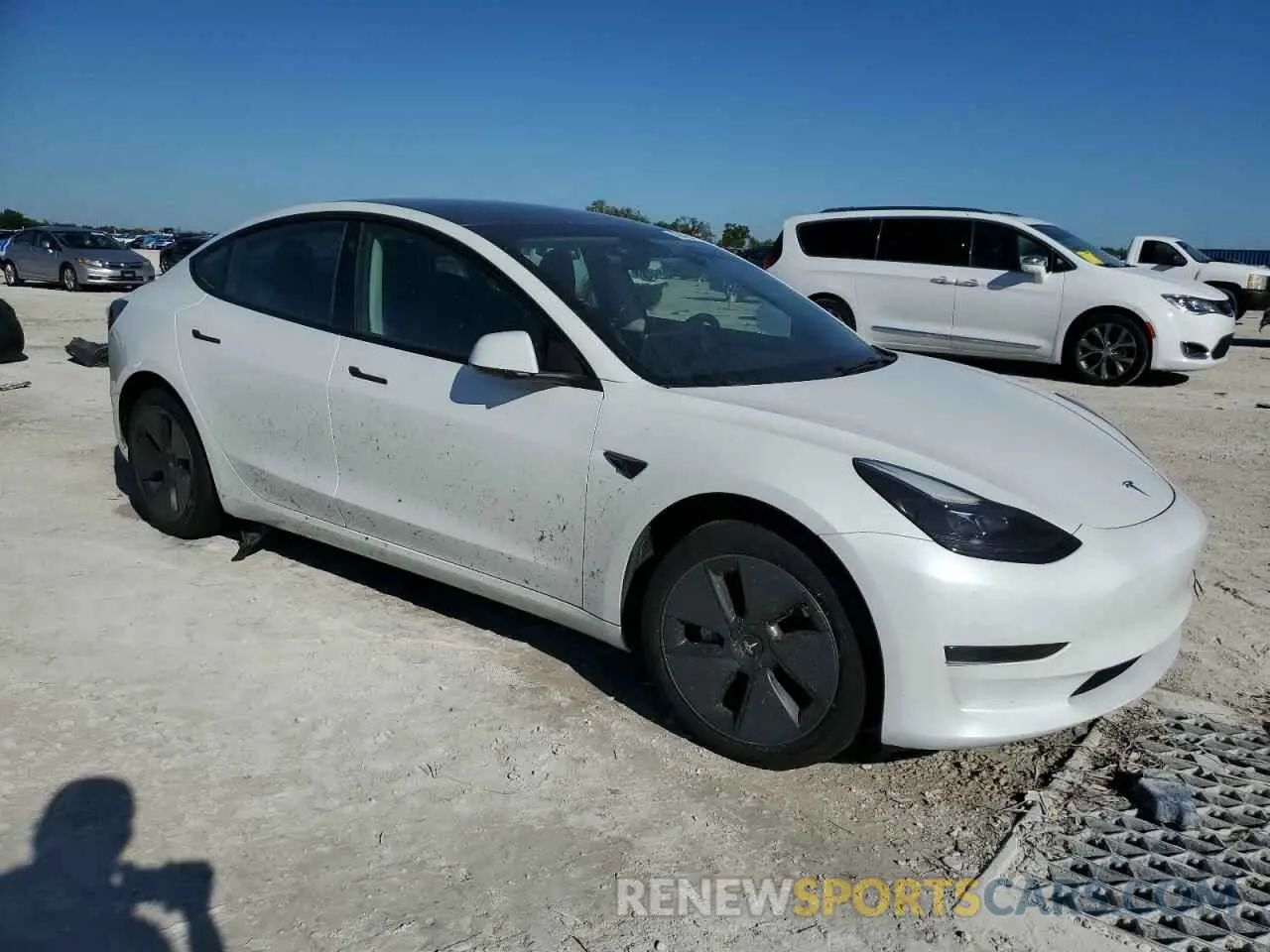 4 Photograph of a damaged car 5YJ3E1EA1PF506972 TESLA MODEL 3 2023