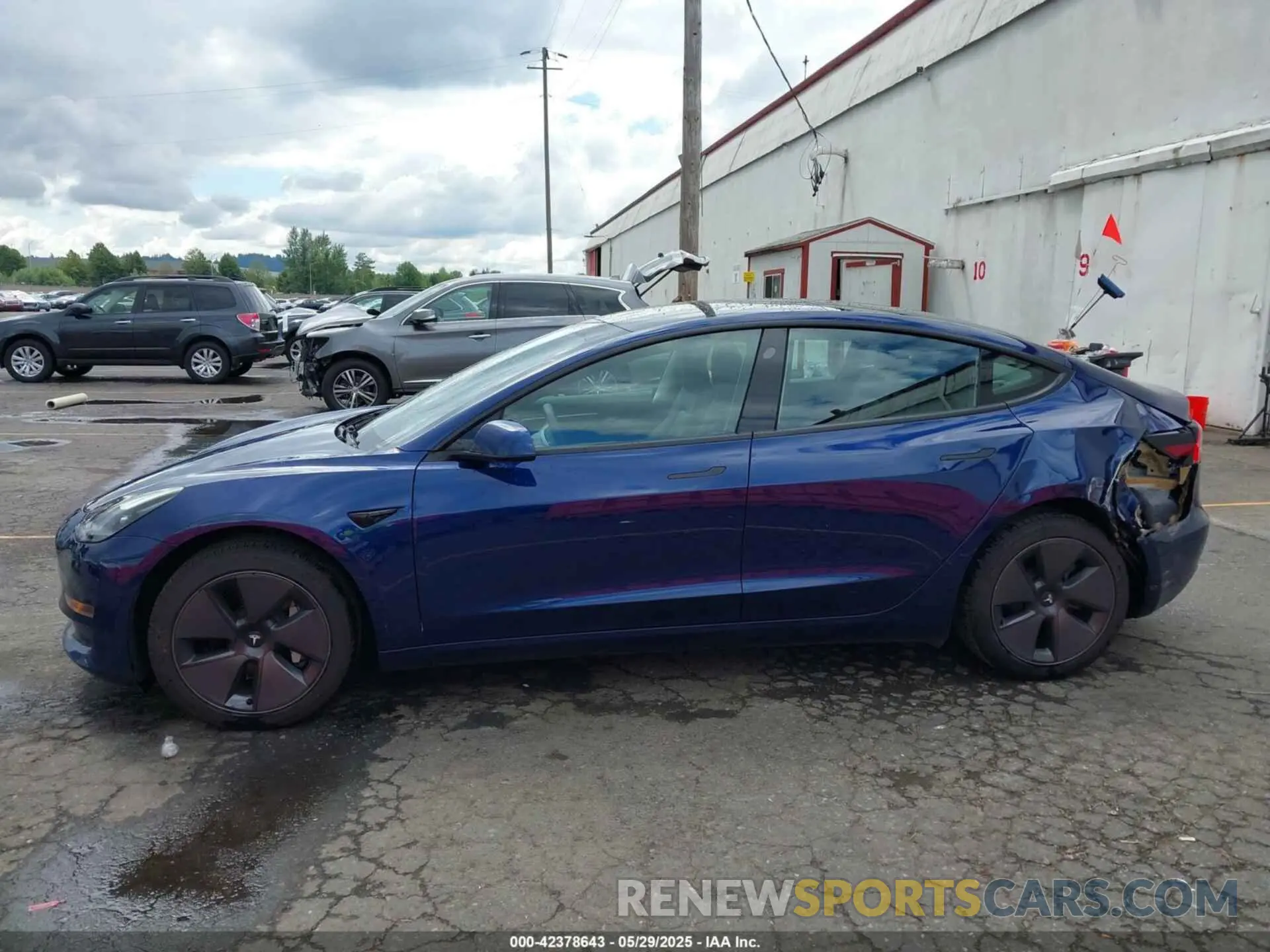 14 Photograph of a damaged car 5YJ3E1EA1PF572180 TESLA MODEL 3 2023