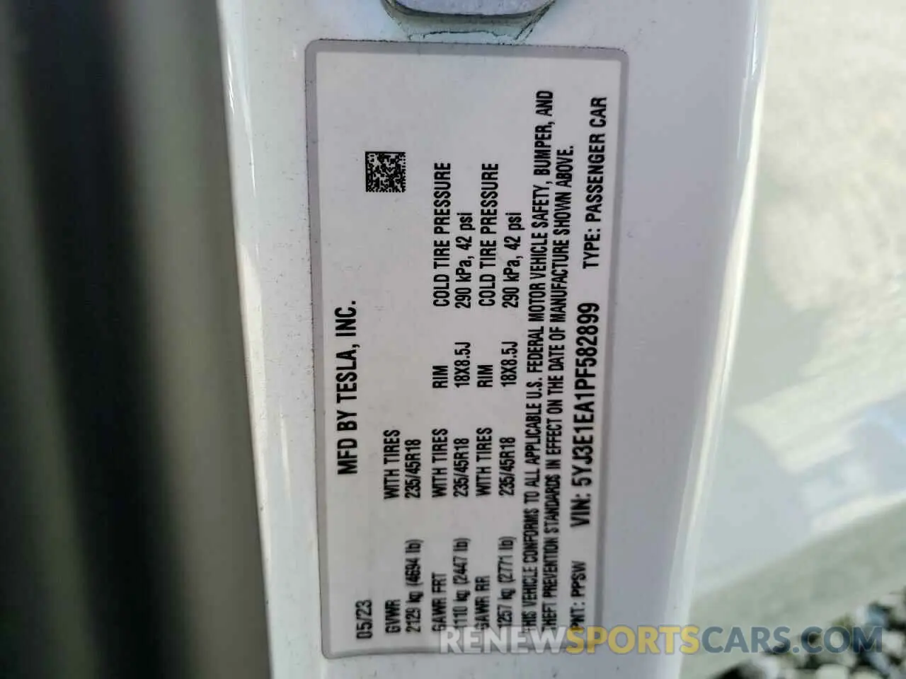 12 Photograph of a damaged car 5YJ3E1EA1PF582899 TESLA MODEL 3 2023