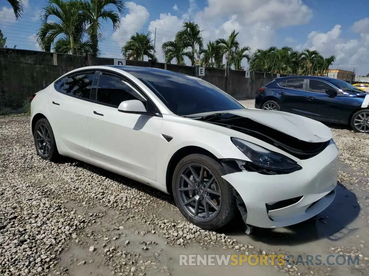 4 Photograph of a damaged car 5YJ3E1EA1PF582899 TESLA MODEL 3 2023