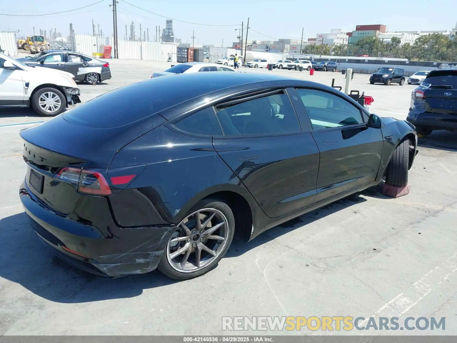 4 Photograph of a damaged car 5YJ3E1EA1PF599699 TESLA MODEL 3 2023