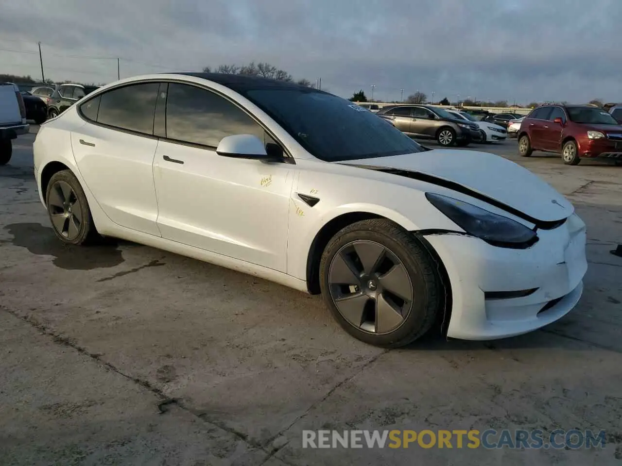 4 Photograph of a damaged car 5YJ3E1EA1PF619885 TESLA MODEL 3 2023
