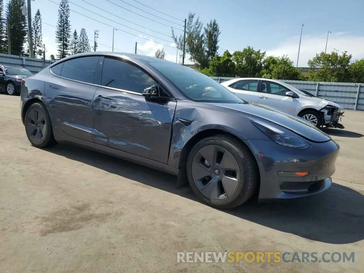 4 Photograph of a damaged car 5YJ3E1EA1PF625766 TESLA MODEL 3 2023