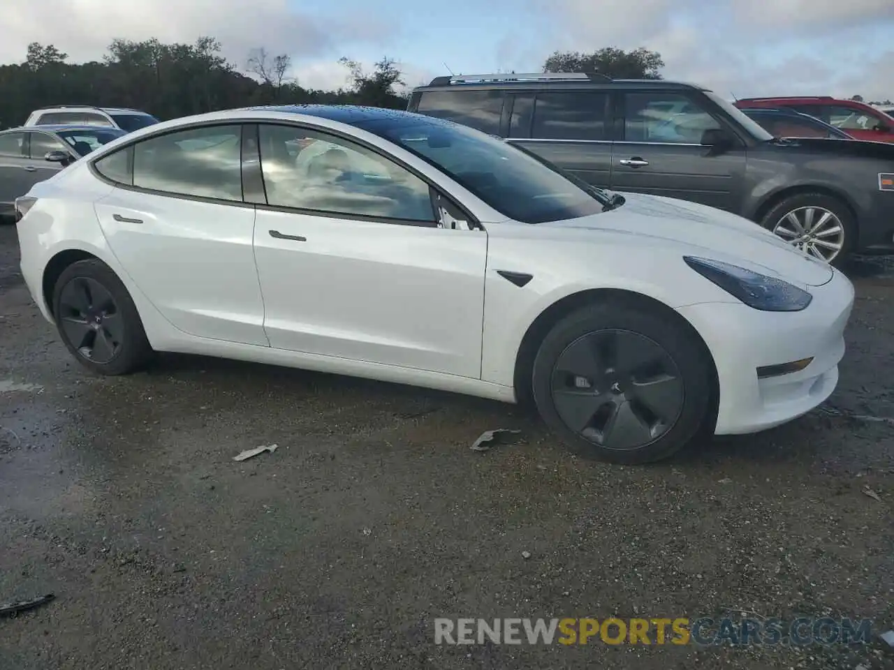 4 Photograph of a damaged car 5YJ3E1EA1PF640896 TESLA MODEL 3 2023