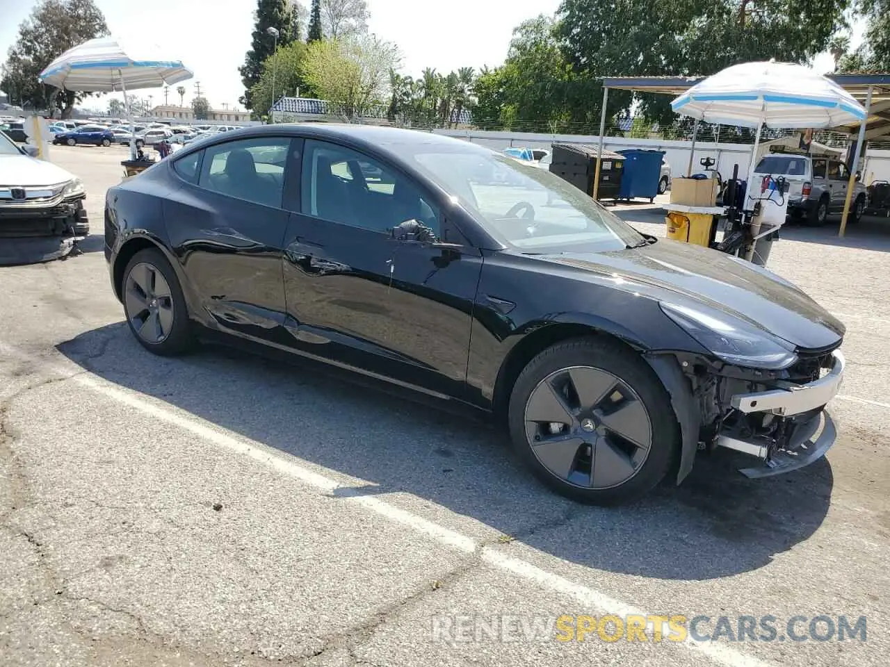 4 Photograph of a damaged car 5YJ3E1EA1PF665572 TESLA MODEL 3 2023