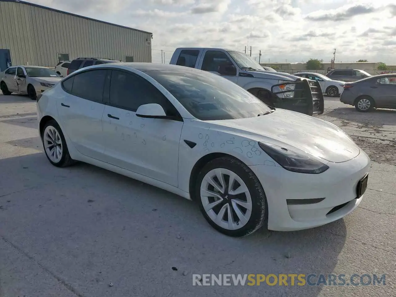 4 Photograph of a damaged car 5YJ3E1EA1PF677494 TESLA MODEL 3 2023