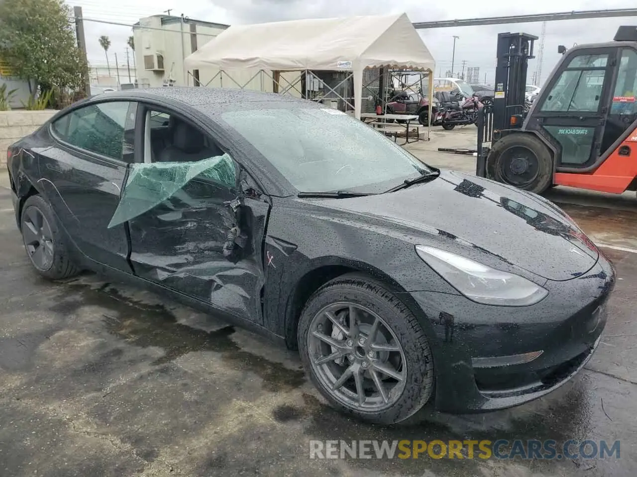 4 Photograph of a damaged car 5YJ3E1EA1PF677592 TESLA MODEL 3 2023