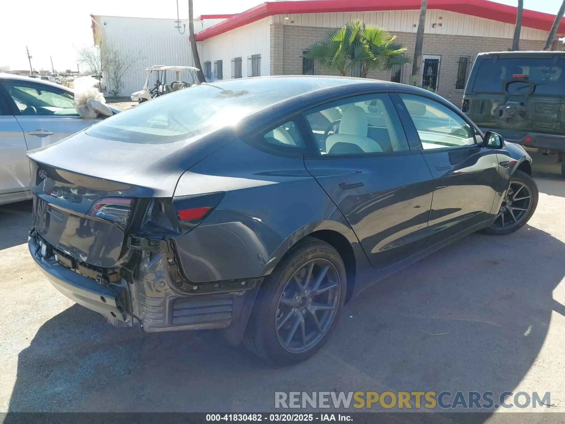 4 Photograph of a damaged car 5YJ3E1EA1PF711921 TESLA MODEL 3 2023