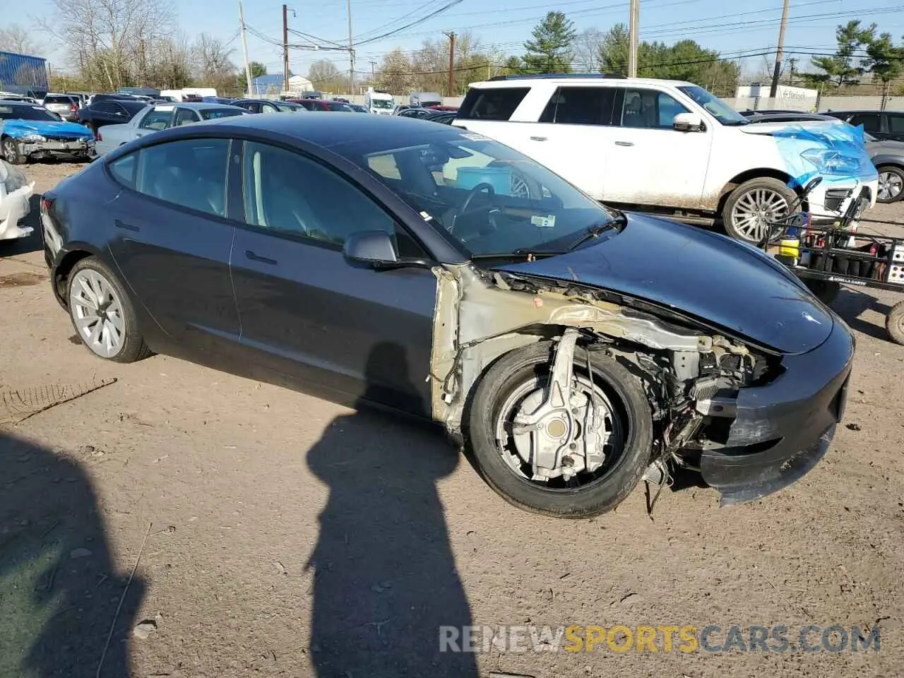 4 Photograph of a damaged car 5YJ3E1EA2PF447477 TESLA MODEL 3 2023