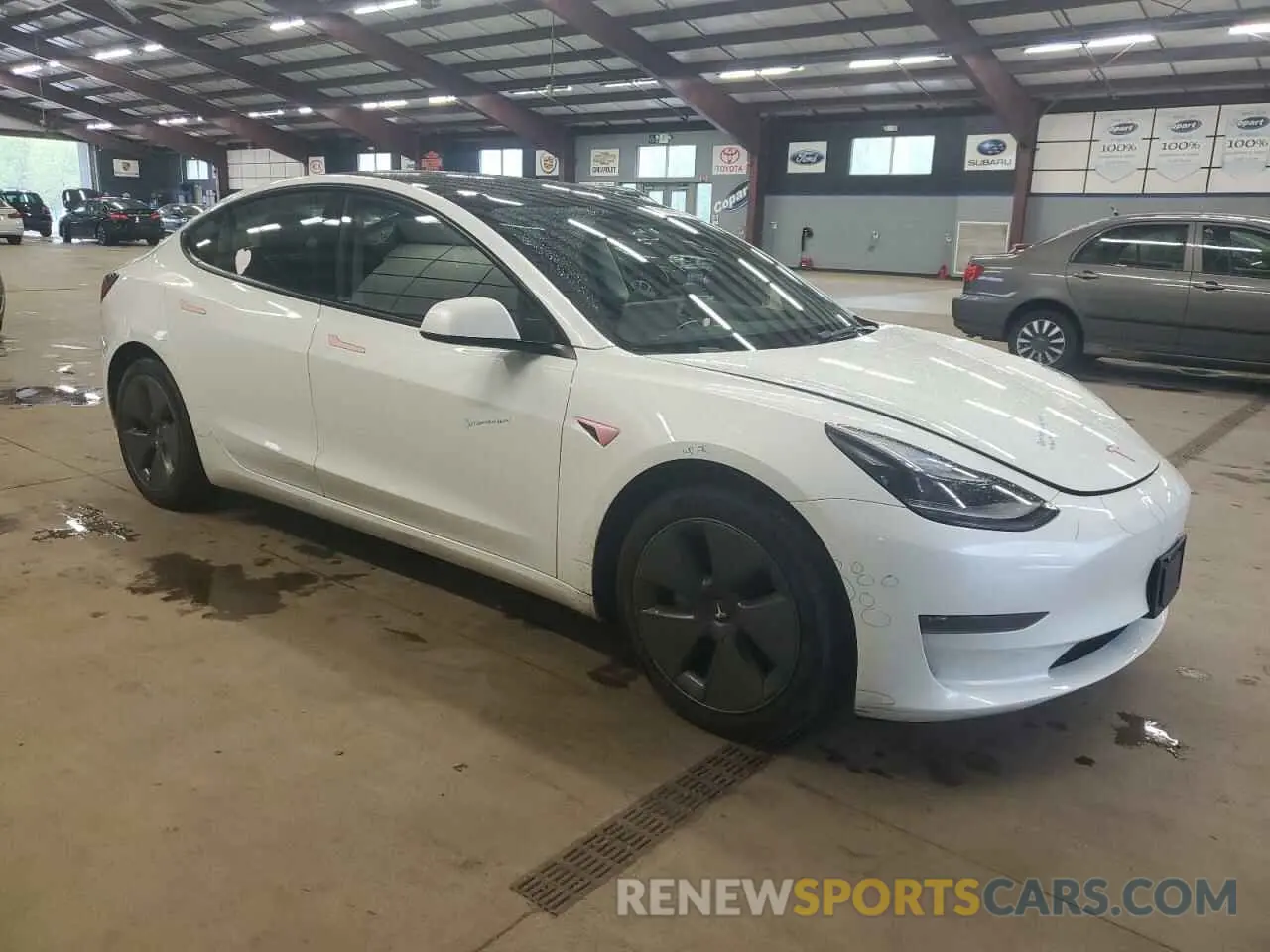 4 Photograph of a damaged car 5YJ3E1EA2PF460536 TESLA MODEL 3 2023