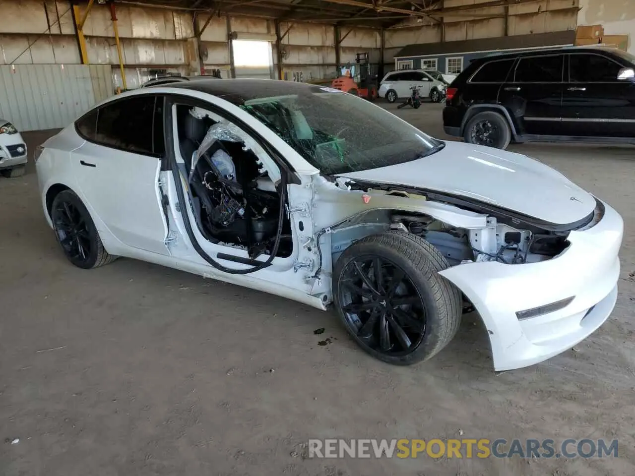 4 Photograph of a damaged car 5YJ3E1EA2PF471049 TESLA MODEL 3 2023