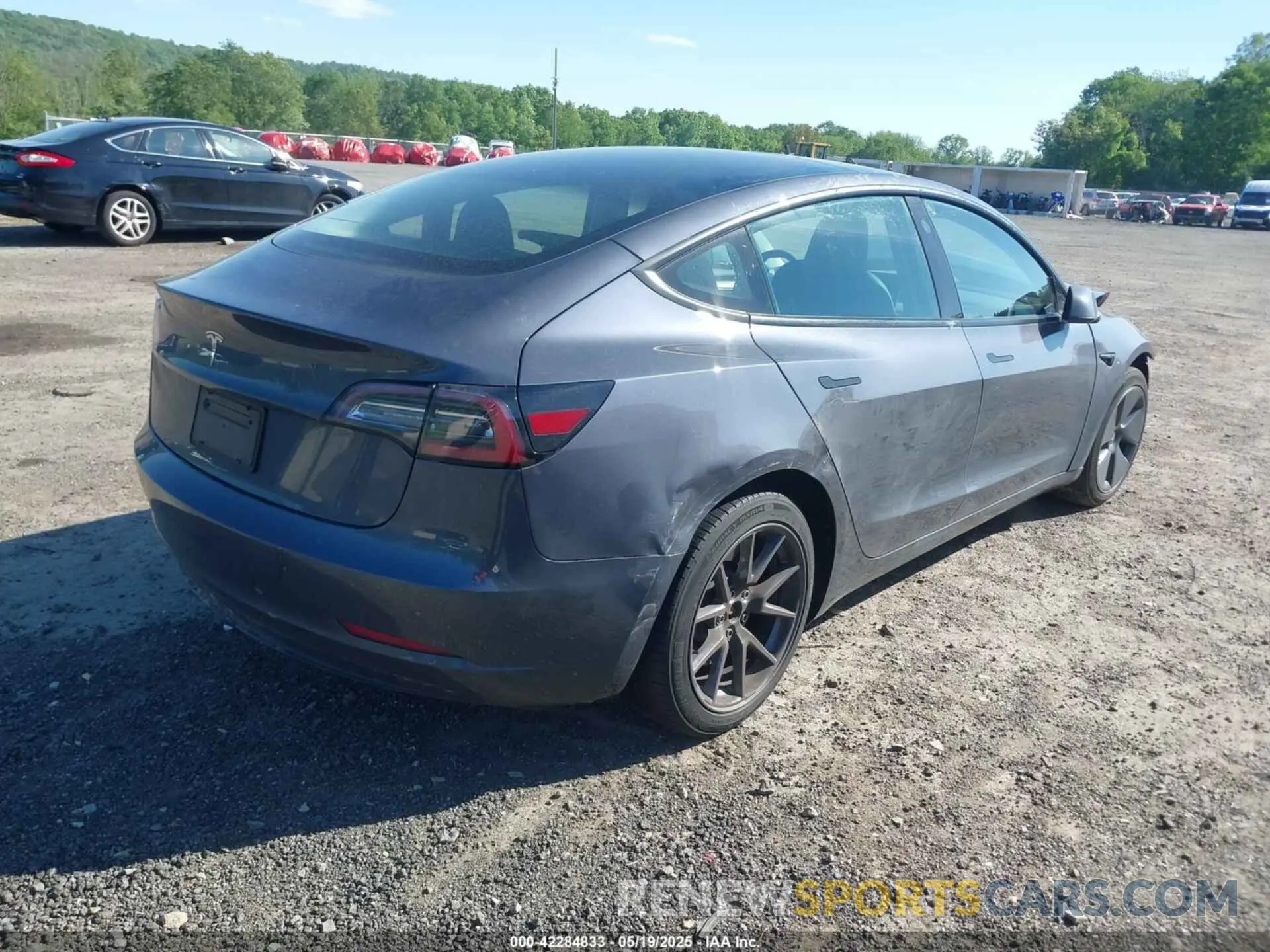 4 Photograph of a damaged car 5YJ3E1EA2PF492659 TESLA MODEL 3 2023
