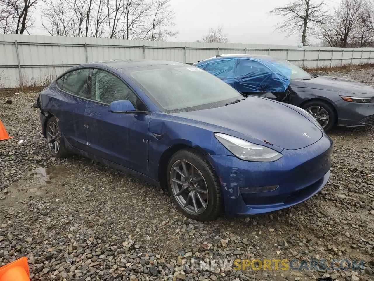 4 Photograph of a damaged car 5YJ3E1EA2PF498137 TESLA MODEL 3 2023