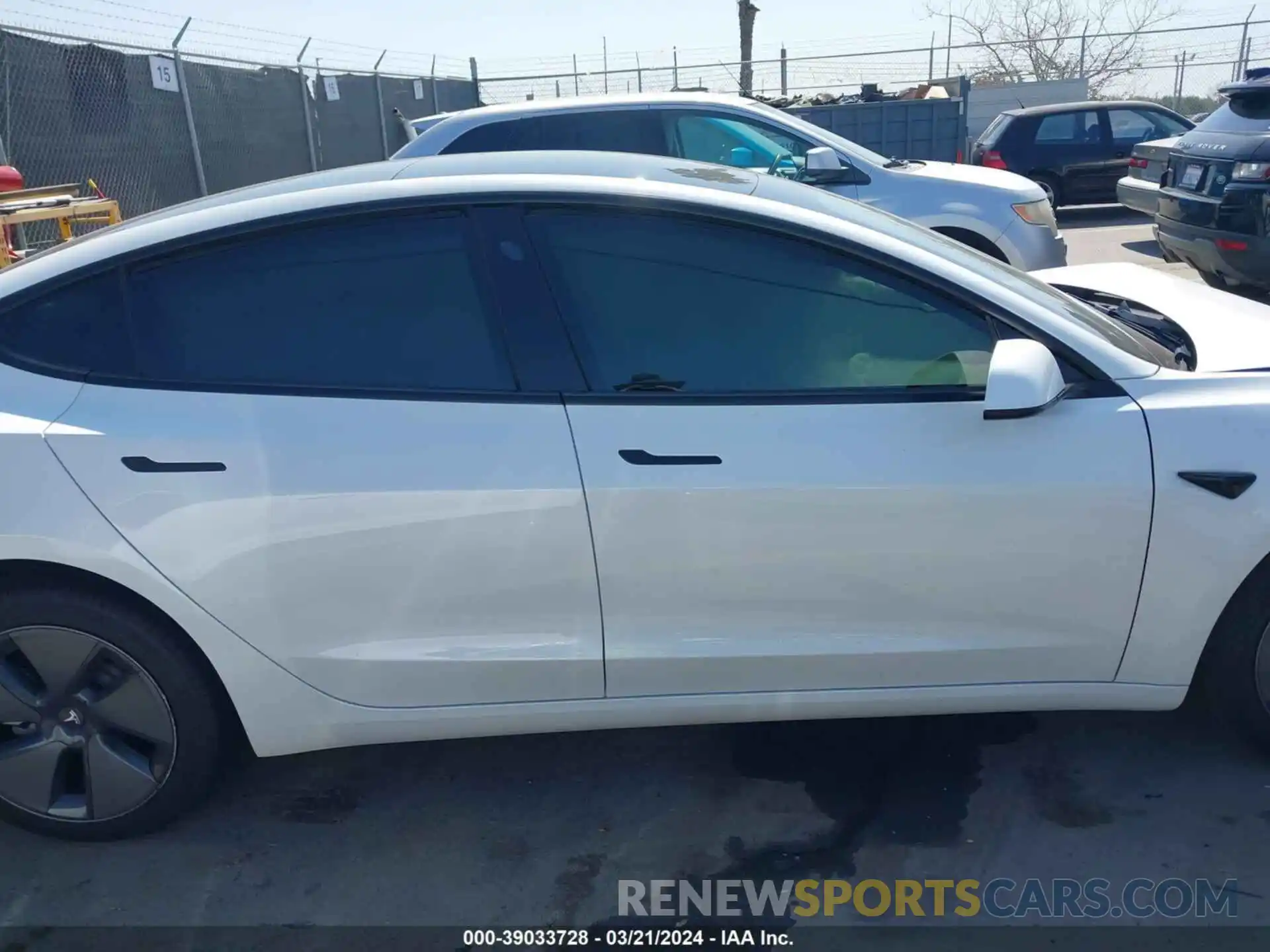 13 Photograph of a damaged car 5YJ3E1EA2PF557428 TESLA MODEL 3 2023