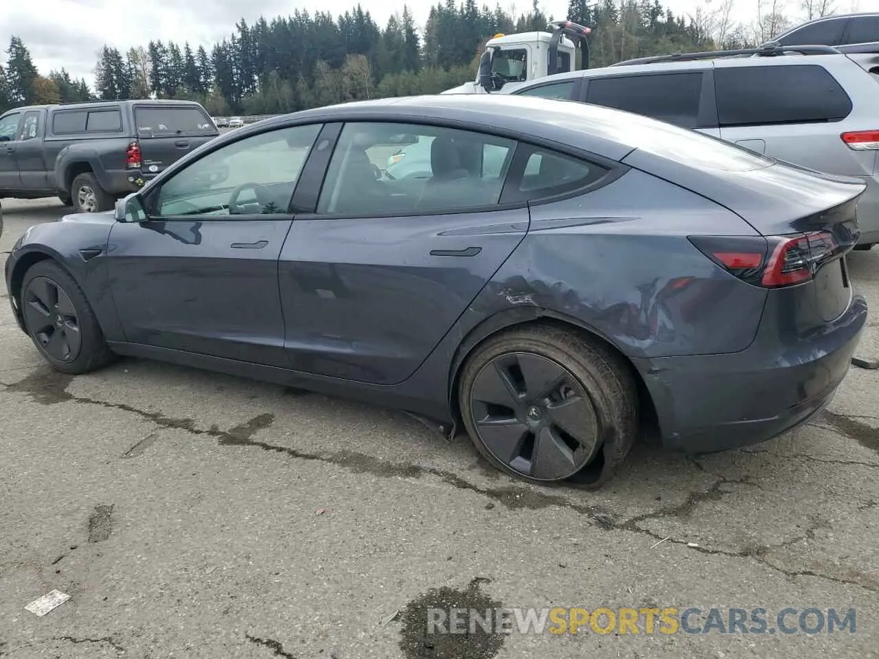 2 Photograph of a damaged car 5YJ3E1EA2PF583219 TESLA MODEL 3 2023