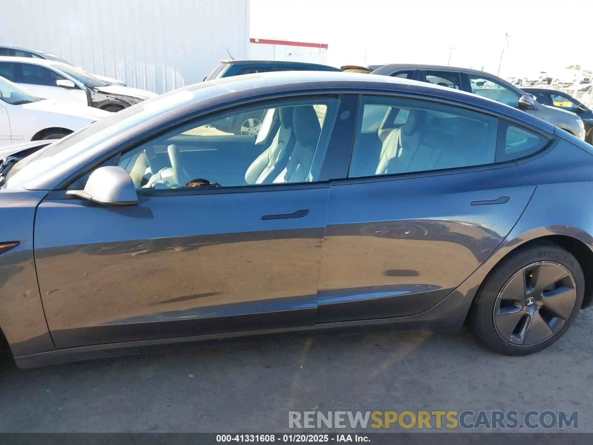 13 Photograph of a damaged car 5YJ3E1EA2PF615974 TESLA MODEL 3 2023