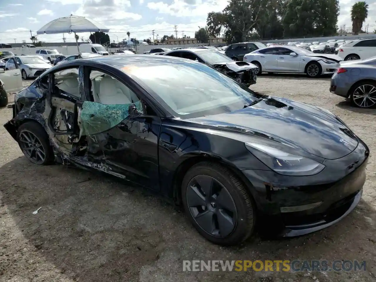 4 Photograph of a damaged car 5YJ3E1EA2PF646612 TESLA MODEL 3 2023