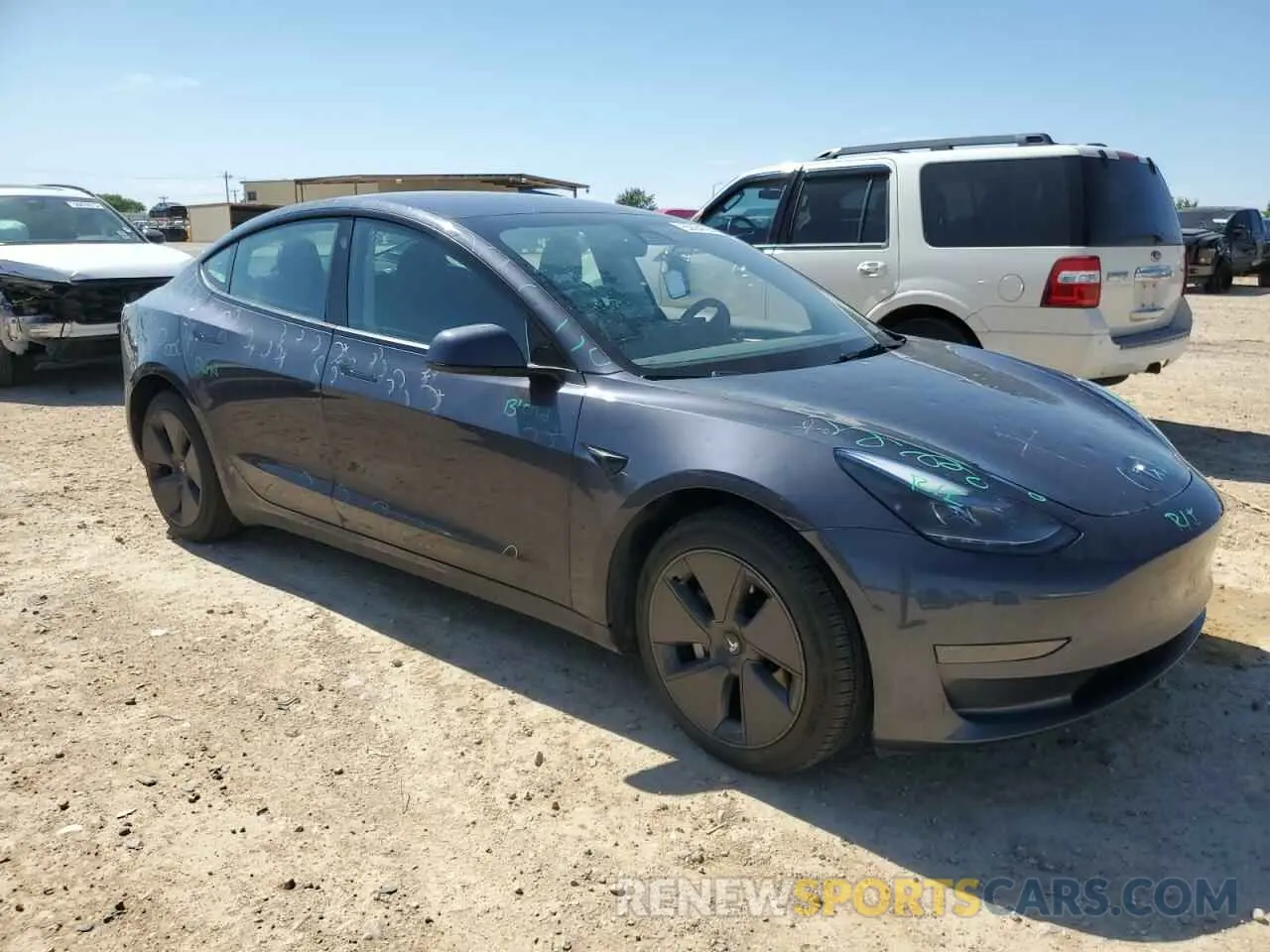 4 Photograph of a damaged car 5YJ3E1EA2PF648098 TESLA MODEL 3 2023