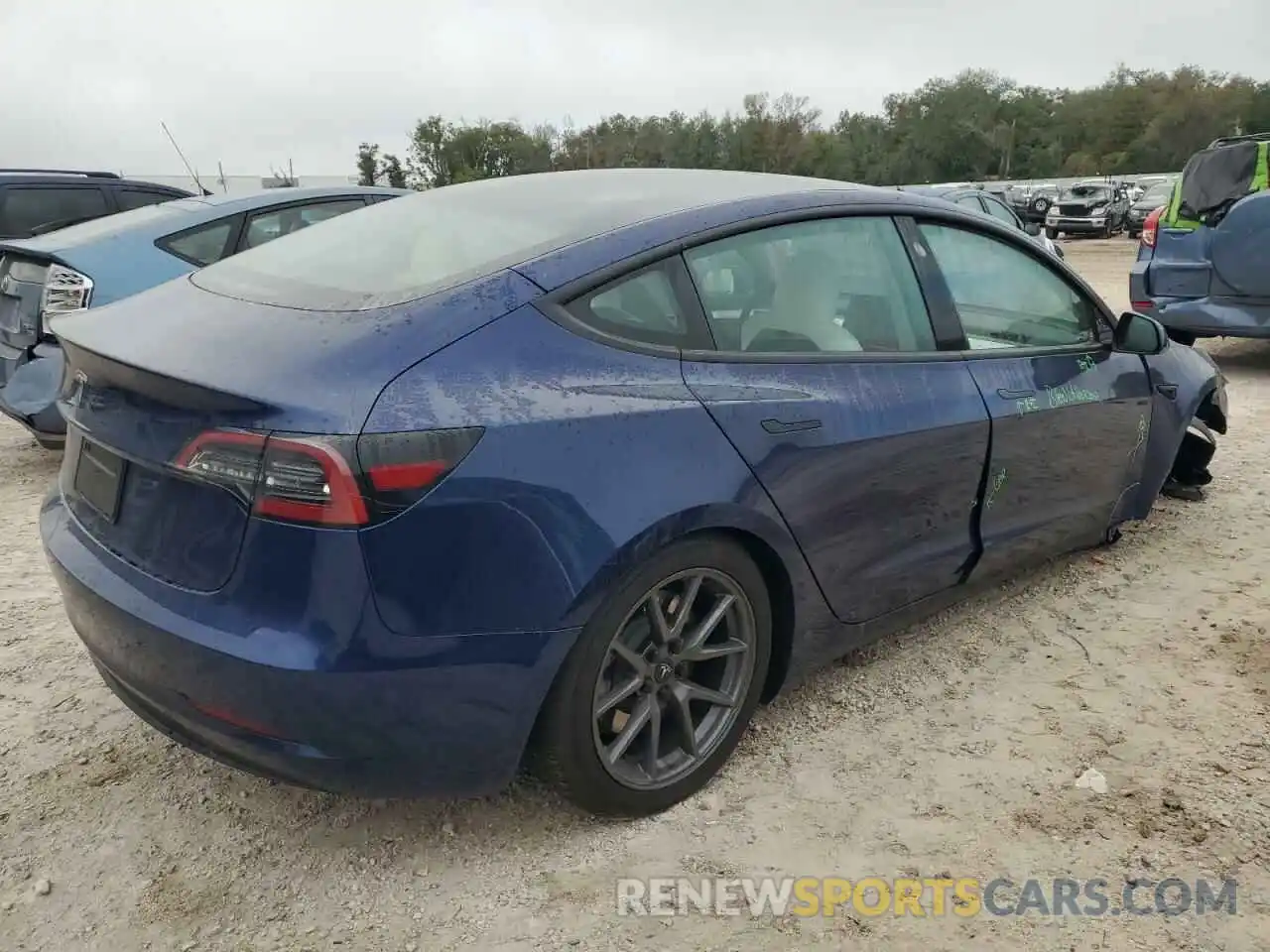 3 Photograph of a damaged car 5YJ3E1EA2PF657304 TESLA MODEL 3 2023