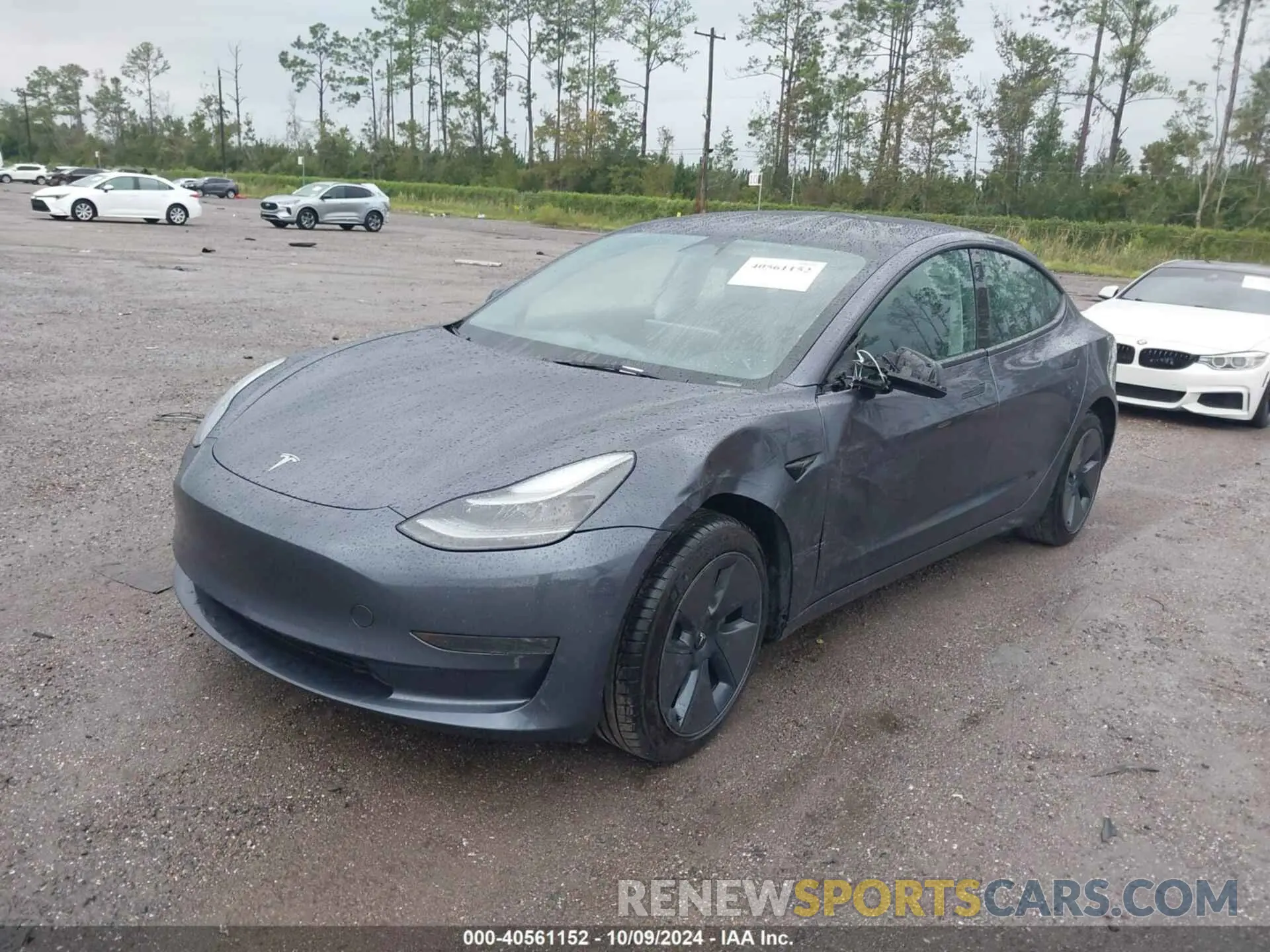 2 Photograph of a damaged car 5YJ3E1EA2PF661451 TESLA MODEL 3 2023