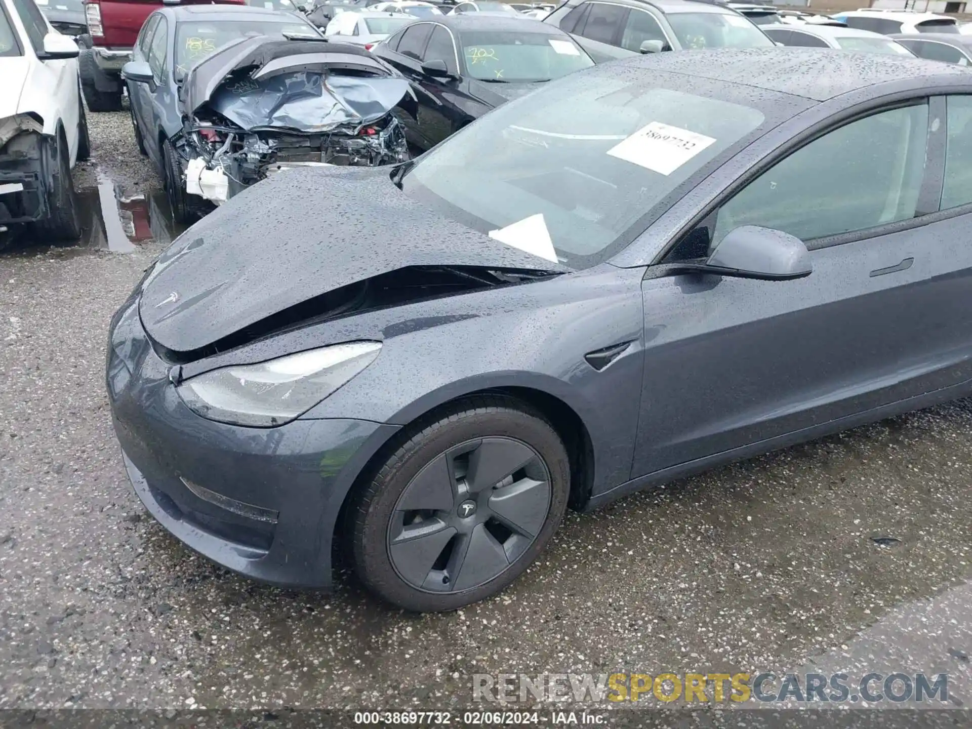 23 Photograph of a damaged car 5YJ3E1EA2PF690898 TESLA MODEL 3 2023